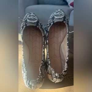 Coach Women's Black and Cream Snakeskin Flats.